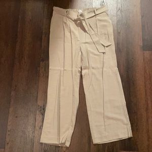 Beige cloth pants.